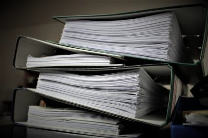 Image showing stack of lever arch files full of design documentation